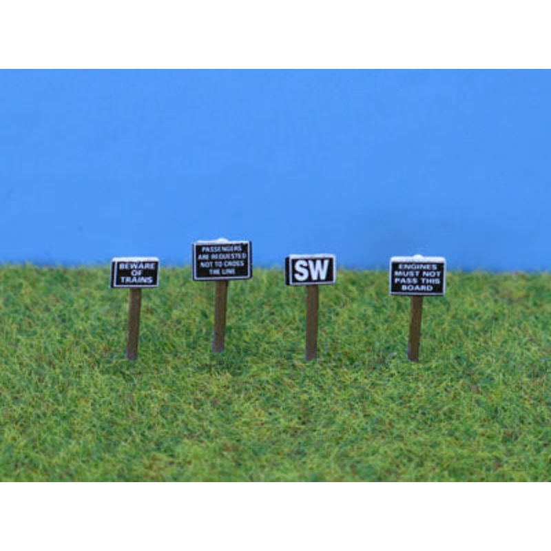 Trackside signs with printed notices (4)