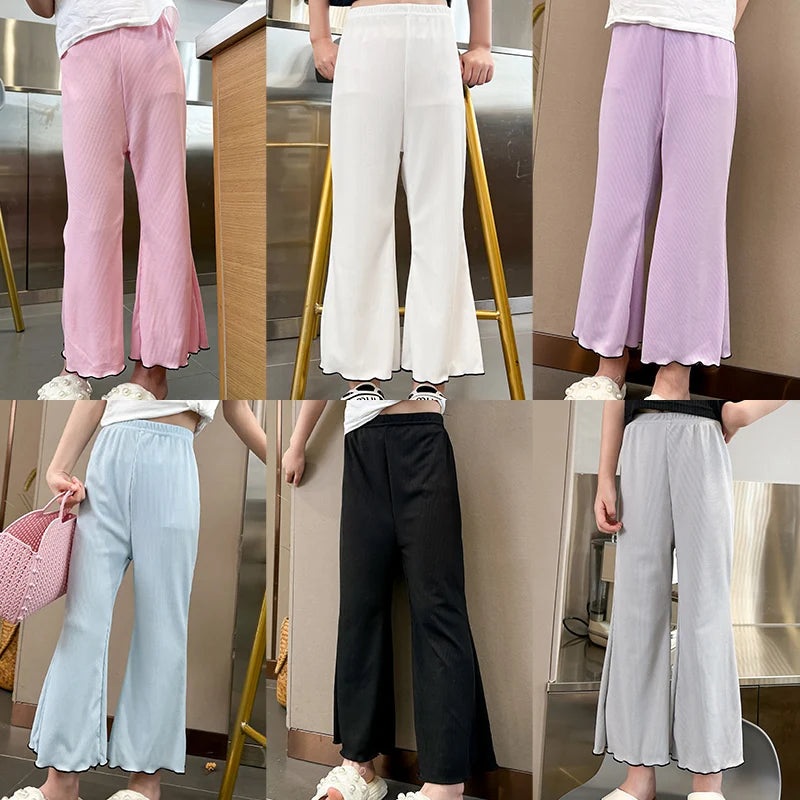 Children’s solid color bell bottoms girls summer color casual fashion pants female students elastic waist pants with wavy sides.